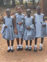 4 happy girls with new uniforms