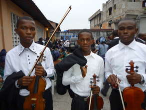 Three young violinists before the concert