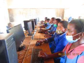 Rimbi Students Getting Hands On Computer Training