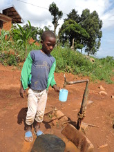 Young child enjoying fresh water