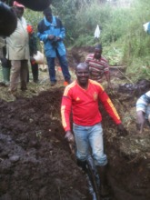 Community volunteers digging water pipelines