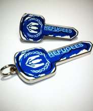 Give $25 or more & receive a Blue Key pin/pendant!