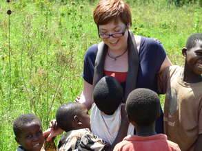 BJ spends time with children at the worksite