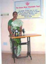 Mrs. G.Kanchana with donated Sewing Machine