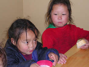 Children eating at Lamp of the Path