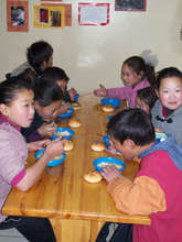 Children eating at Lamp of the Path