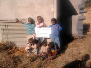 The children of Bergnek at the pump house