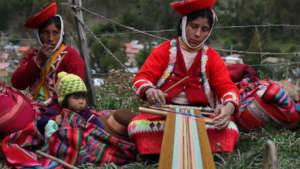 Jesusa weaves near her home in Patacancha.