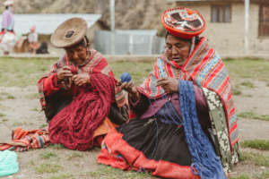 Margarita and Maria Salome get the yarn ready