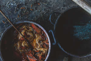 Yarn in the dye pot in a previous workshop
