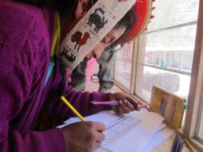 Cipriana sketches her weaving design