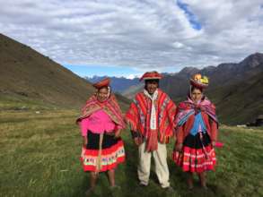 Avelina, Benedicto, and Jesusa with mountains