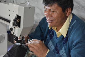Sr.Tomas enjoys sewing process with new machine
