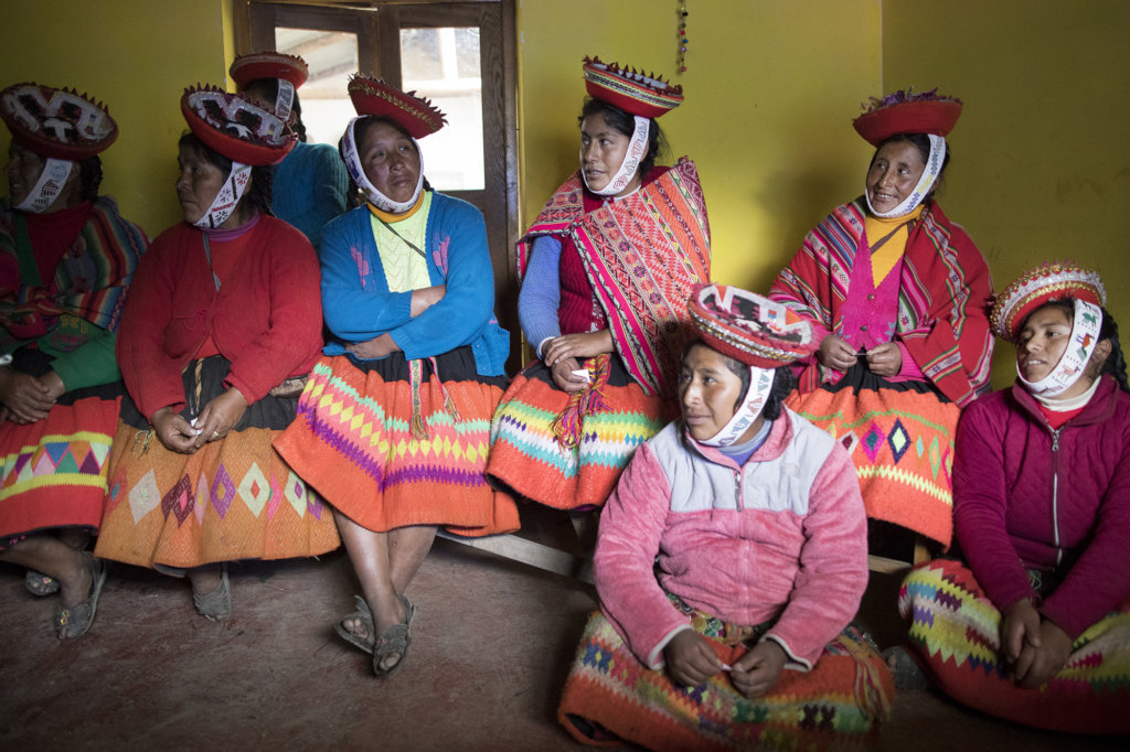 The women of Huilloc attend a media workshop.
