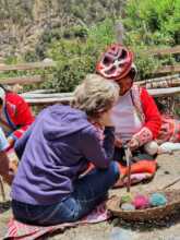 Yolanda gives a weaving lesson during a tour