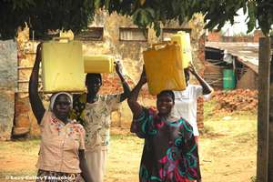 GWWI in Moyo- How to carry 5 gallons of water