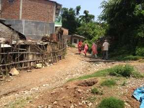 Yoga Tour participants strolling thru village.