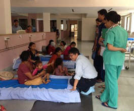 Dr. Rai doing his rounds in the new surgery ward.