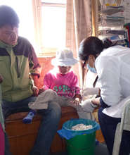 Burn patient recieving follow-up care.