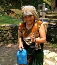 Yoga Tour: Bandipur woman carrying water.