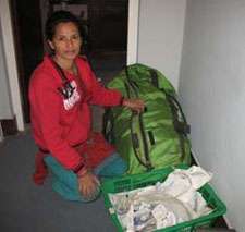 Volunteers deliver donated supplies from overseas.