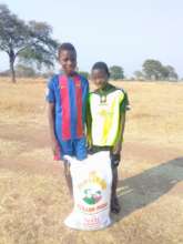 Orphans receive bags of maize