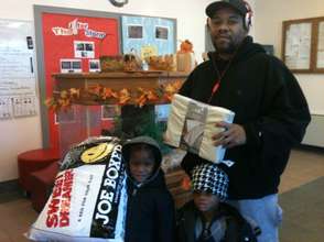 Members of the Davis family pick up pillows