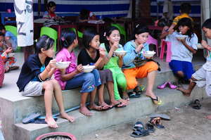 Children gather for a hearty meal