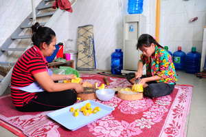 Housemothers prepare food
