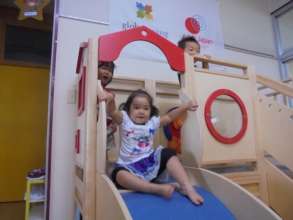 Children play on the slide