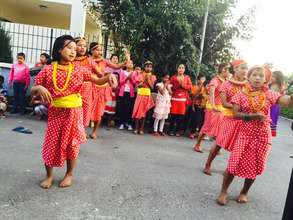 Children performing cultural dance...