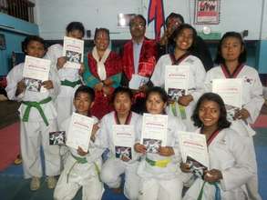 Showing certificates after won Taekwondo compet...