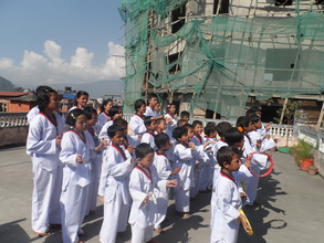Children performing in Taekwondo dress!