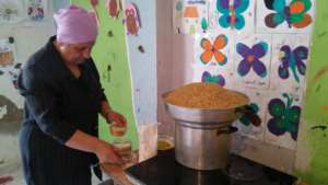 Hajjar preparing the dish in Karama