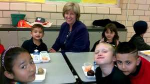Jill Kidd at Pueblo City Schools serves breakfast