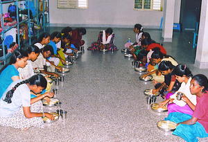 Tsunami displaced girl students in Santhome: meal time
