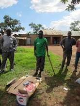 Beneficiary with solar panel to open his salon