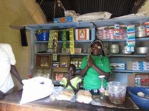 Beneficiary in her retail shop