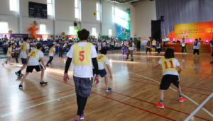 Dodgeball competition between staff and clients