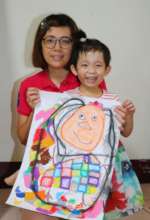 Hsiao-He with her drawing