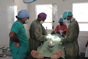 visiting surgeon doing some training