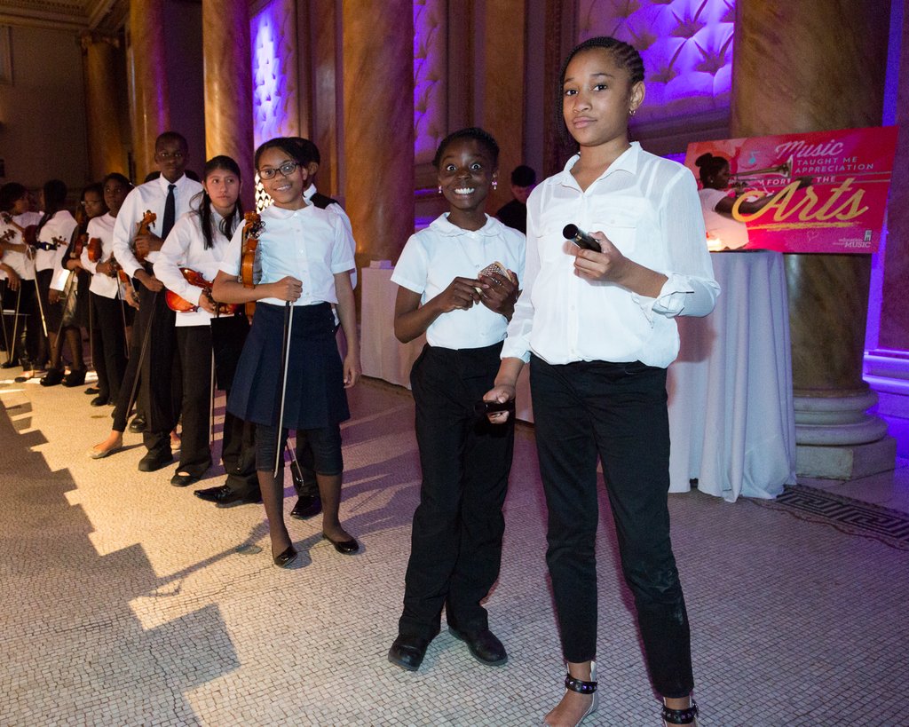 Students prepare to step on stage