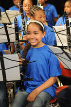 April performing with PS 76's band