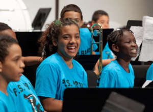 A band student smiles after a performance!