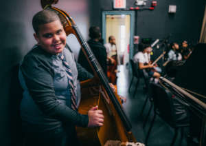 A bassist is all smiles! Credit: Daniel Pagan