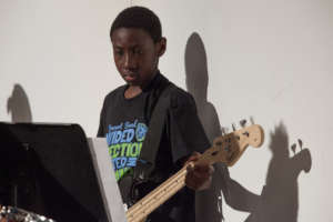 A guitarist concentrates on his music-making!