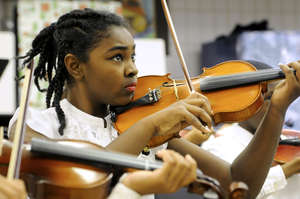 A student focuses before performing her next piece