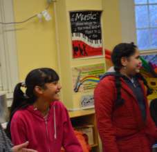 Students smile infectiously during music class!