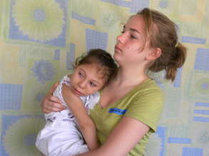 A volunteer holding Alejandra
