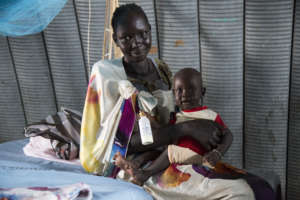 A mother and child visit the clinic in Malakal